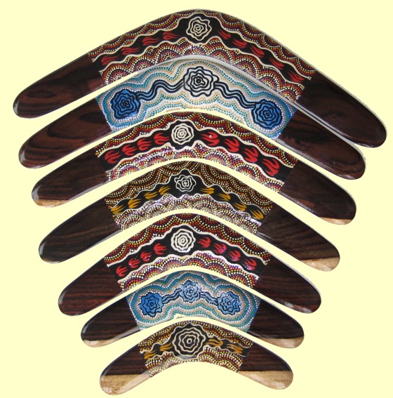 Contemporary dot art timber boomerangs hand painted with waterhole motif