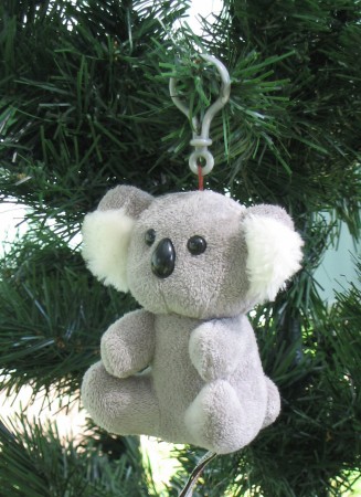Small koala soft toy with vibrating device